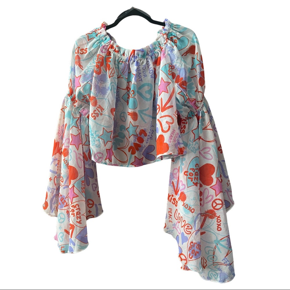 Funky 70s style crop top with balloon sleeves